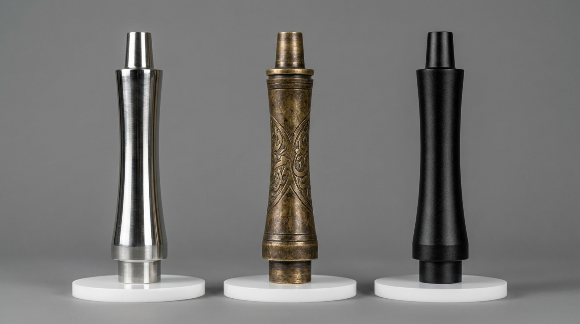 Three hookah mouthpieces in silver, antique bronze, and matte black finishes displayed side by side.